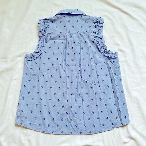 β
Kate Spade Sleeveless Palm tree Button up Top - Light Blue β
- Picture 9 of 17
